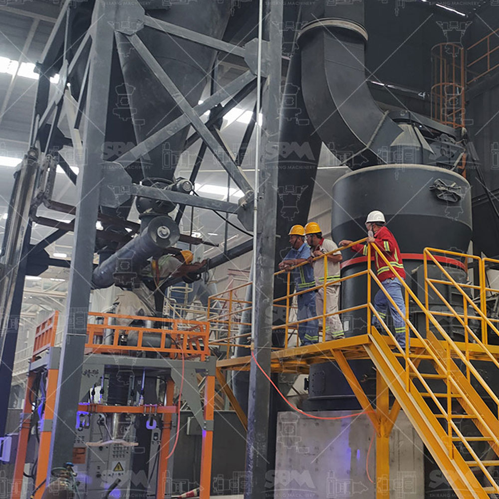 Close-up of MTW European Trapezium Mill showing its compact gear transmission system and curved shovel blades.