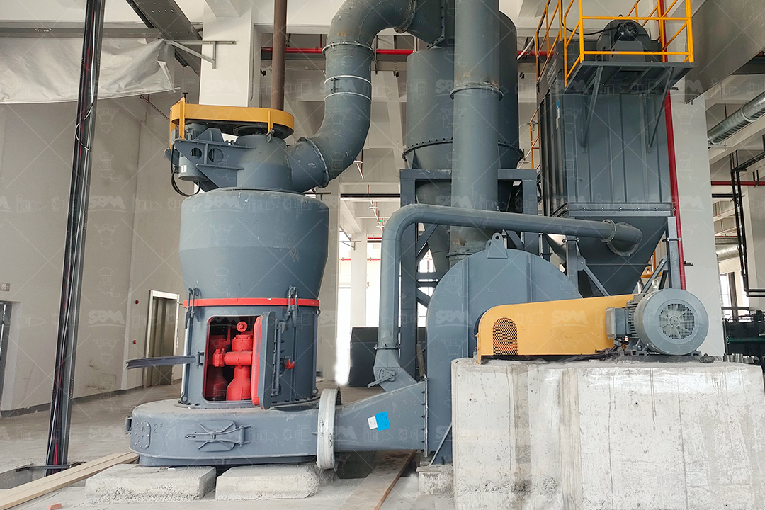 MTW European Trapezium Mill in an industrial mineral processing plant, showing its compact structure and ductwork.