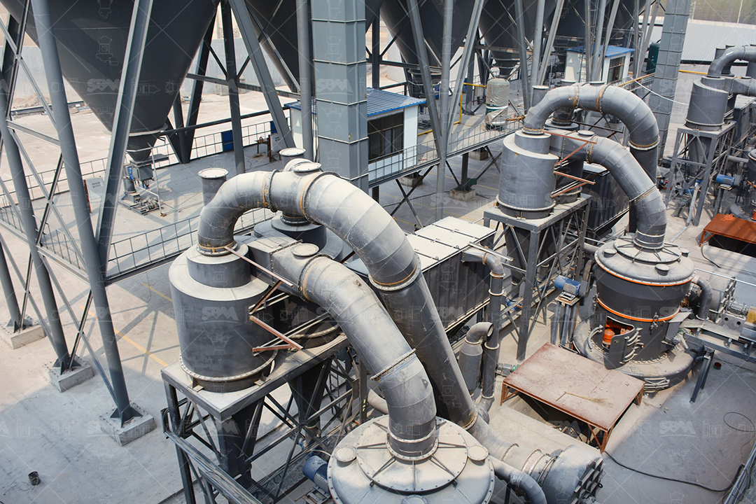 MTW Series European Trapezium Grinding Mill in an industrial setting showing its compact structure and ductwork.